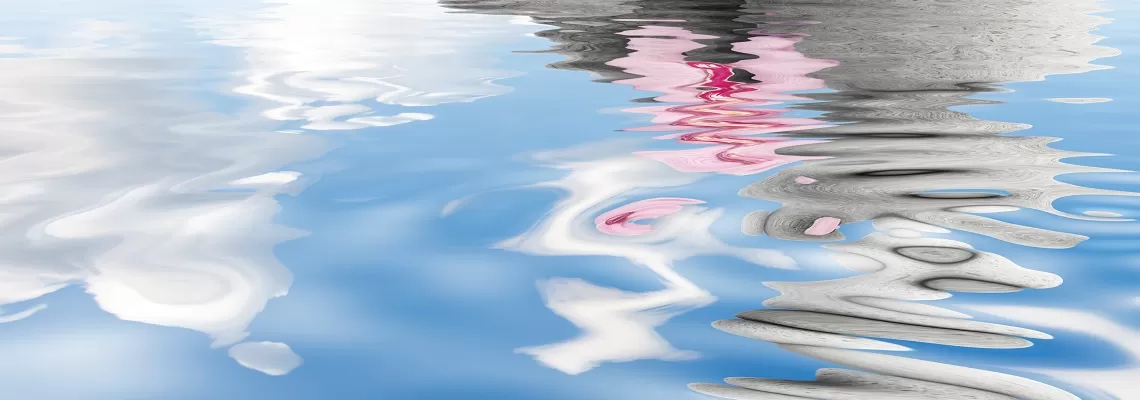 Zen stones on rippling water